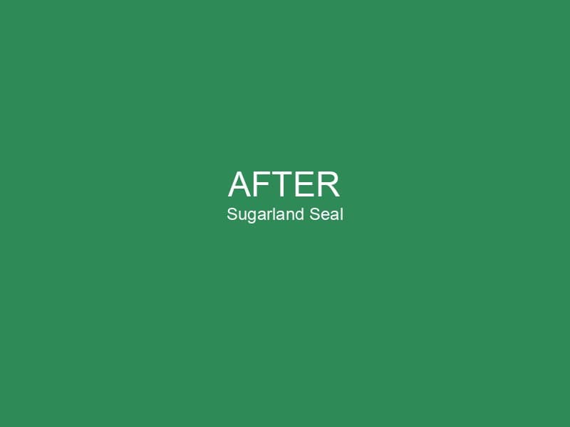 Freshly sealcoated medical campus lot with bright striping in Sugar Land