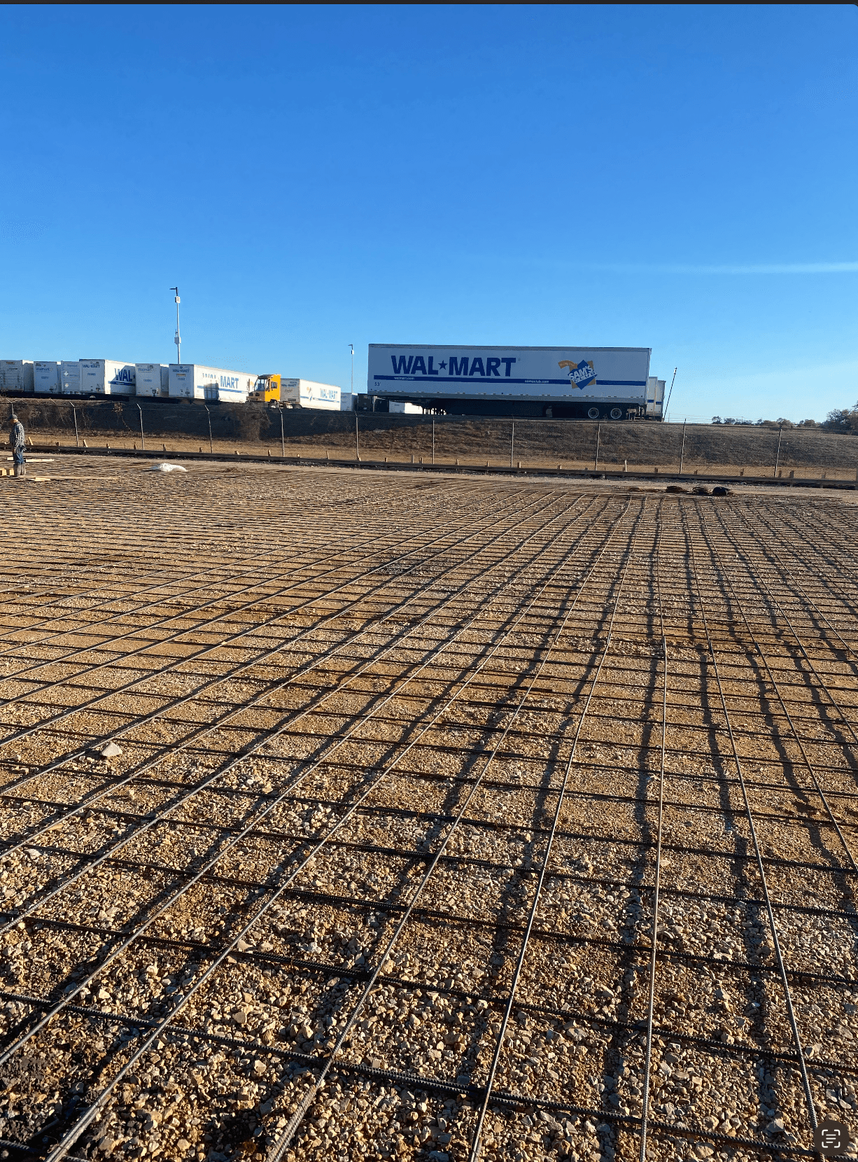 Houston paving crew operating roller on freshly paved surface